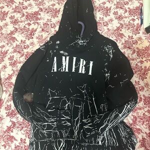 Amiri Sweater with lightning bolt design, small hole on the pocket
